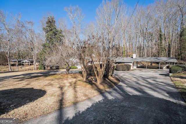 view of front of property with a carport