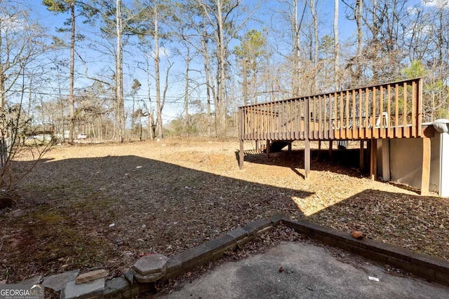 view of yard with a deck