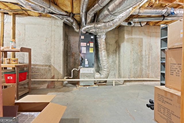 basement featuring heating unit