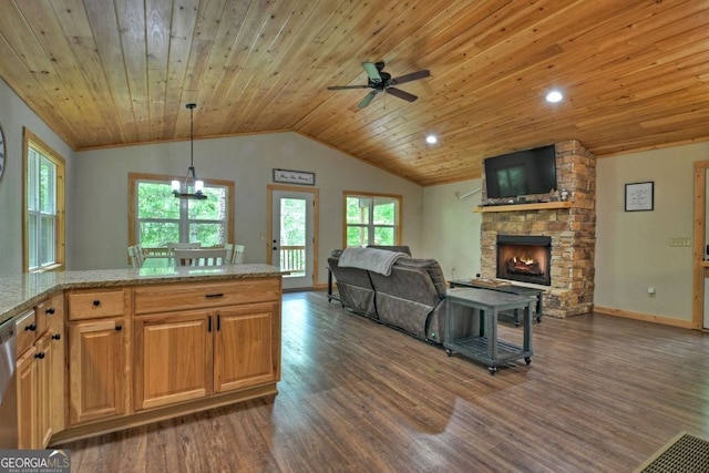 kitchen with pendant lighting, a fireplace, lofted ceiling, dark hardwood / wood-style flooring, and wooden ceiling