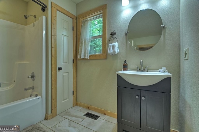 bathroom with shower / washtub combination and vanity