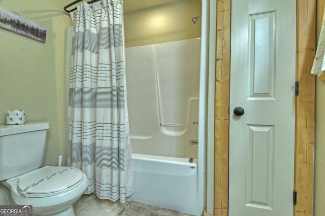 bathroom featuring toilet, tile patterned floors, and shower / bathtub combination with curtain