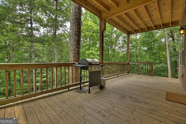 wooden deck with grilling area