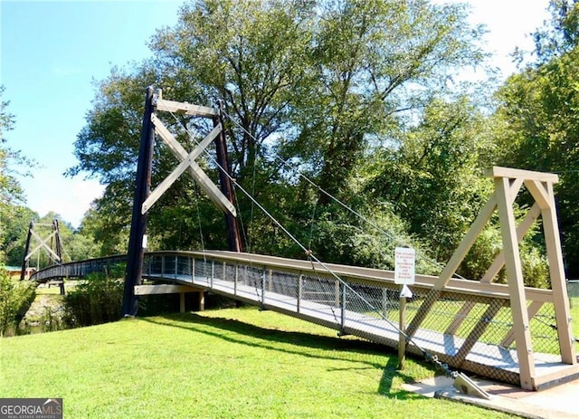 view of playground featuring a lawn