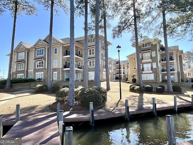 dock area featuring a water view