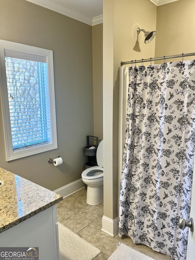 bathroom with crown molding, tile patterned flooring, vanity, curtained shower, and toilet