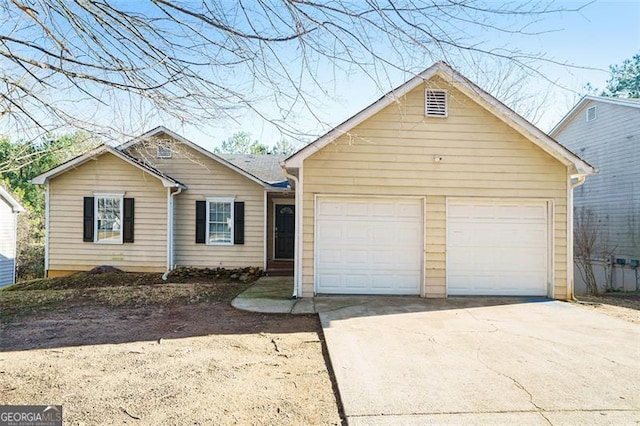 single story home with a garage