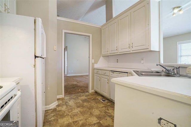 kitchen with sink and white appliances