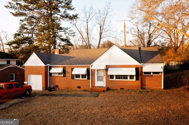 single story home featuring a garage