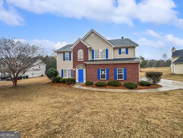 view of front of property with a front lawn