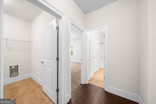 washroom with hardwood / wood-style flooring