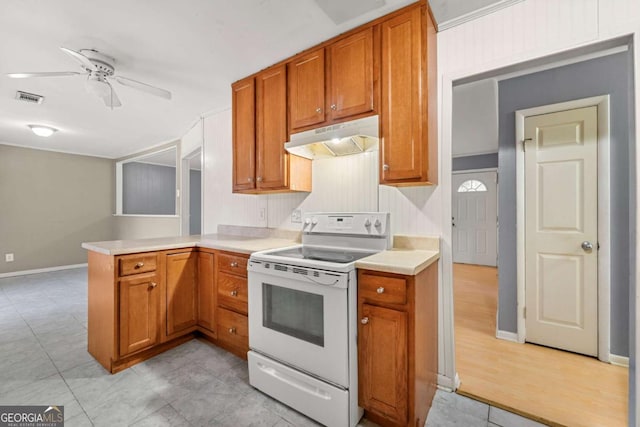 kitchen featuring white electric range, ceiling fan, and kitchen peninsula