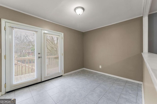 interior space with ornamental molding, light tile patterned floors, and french doors