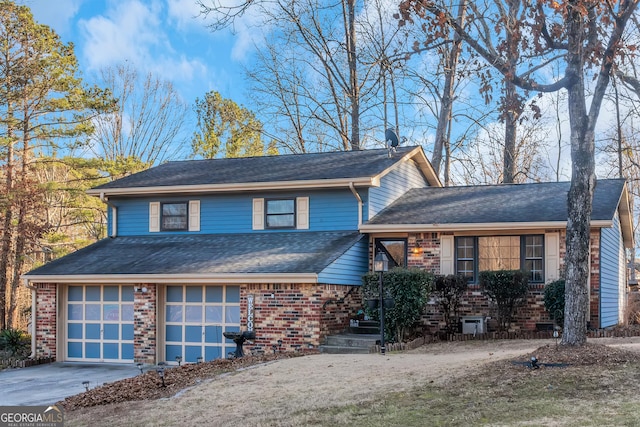 view of front of home with a garage