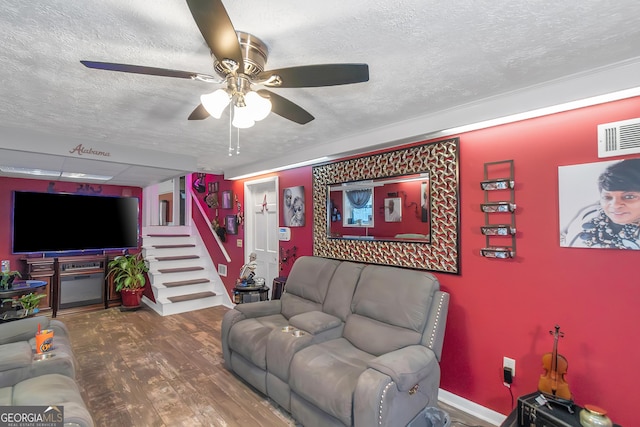 bedroom featuring hardwood / wood-style floors, a closet, and ceiling fan