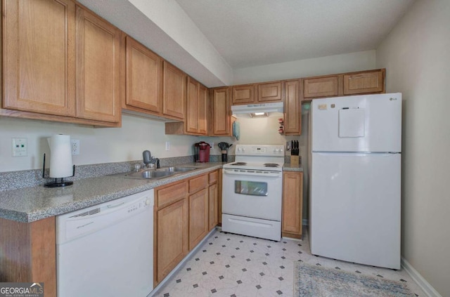 kitchen featuring white appliances and sink