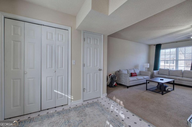 unfurnished living room with a textured ceiling