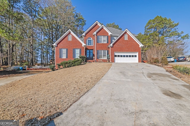 view of front of home with a garage