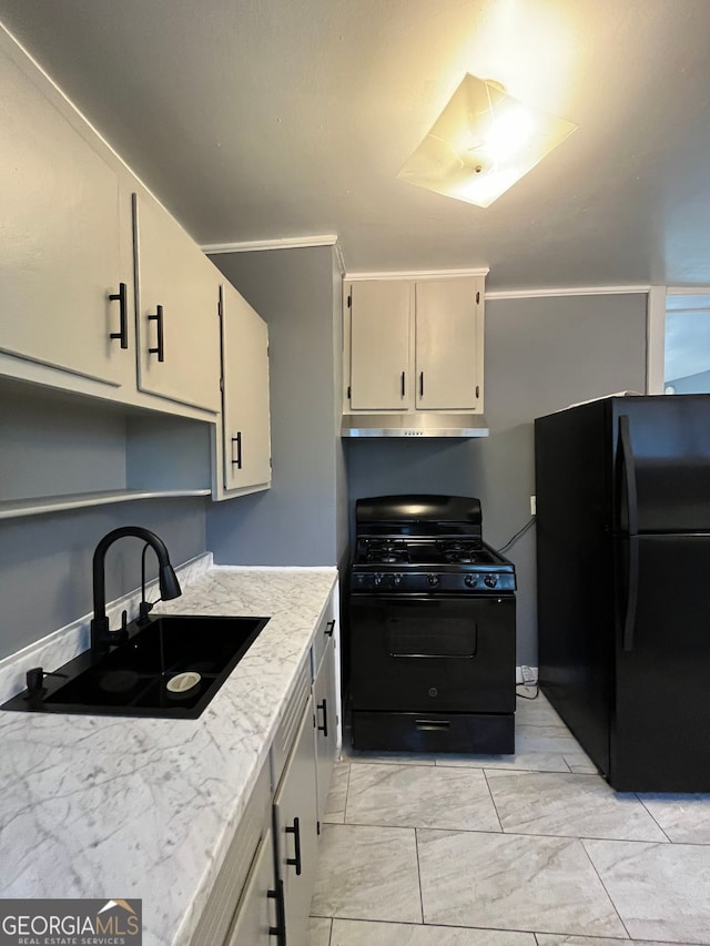 kitchen with sink and black appliances