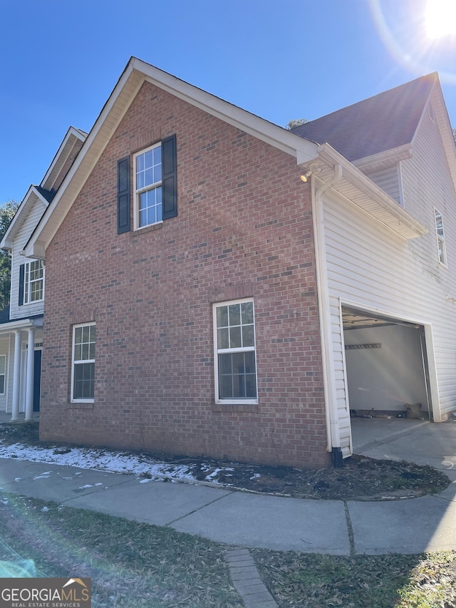 view of home's exterior with a garage