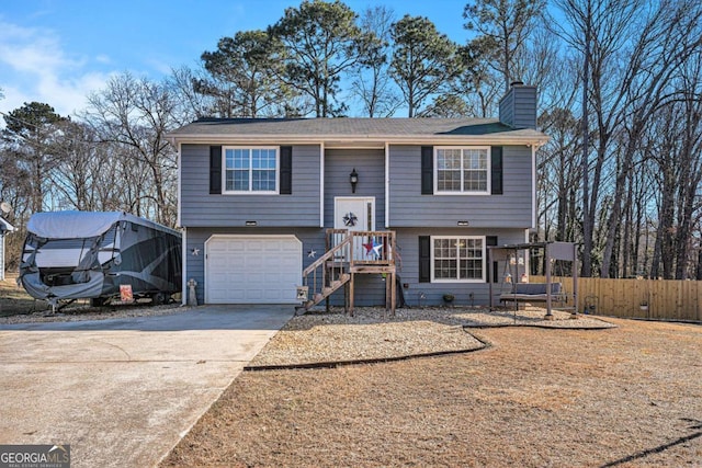 split foyer home featuring a garage