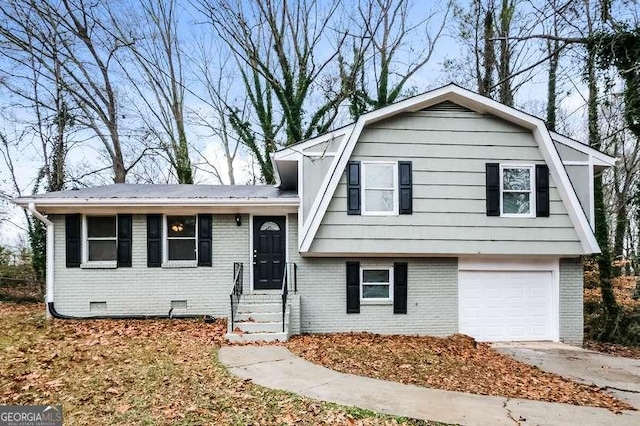 split level home featuring a garage