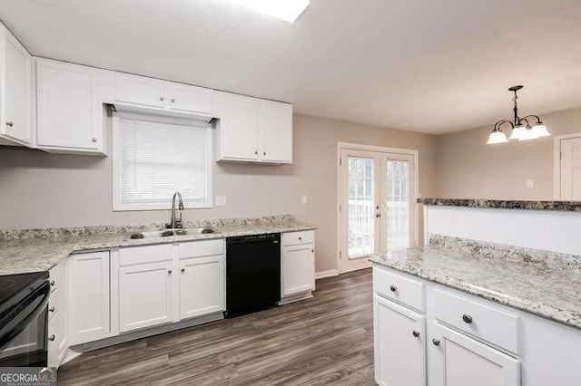 kitchen with dishwasher, sink, pendant lighting, and white cabinets