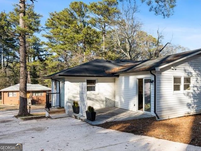 exterior space with a patio