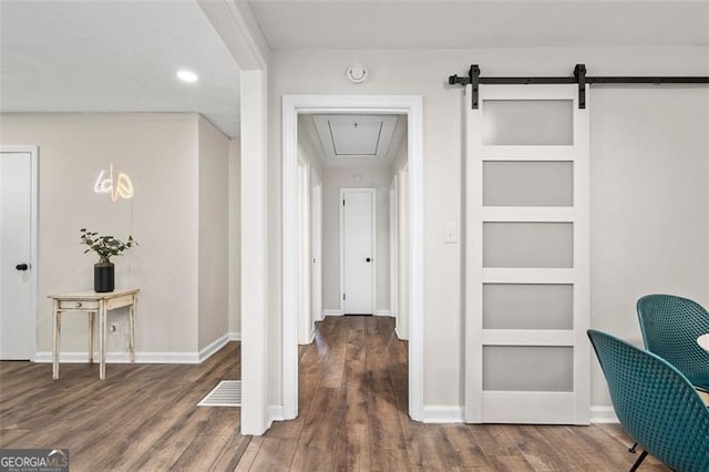 hallway with dark hardwood / wood-style flooring