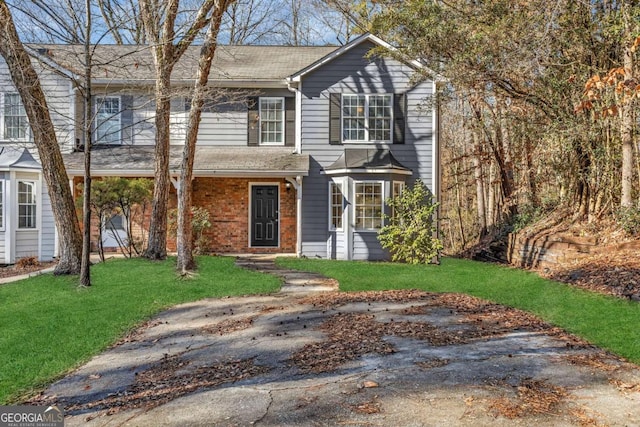 view of front of property with a front lawn