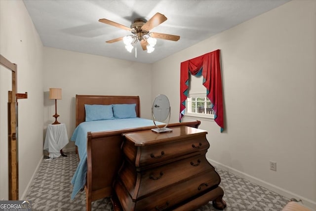 1579 Howell Highlands Dr, Stone Mountain, GA 30087 - carpeted bedroom with ceiling fan and baseboards