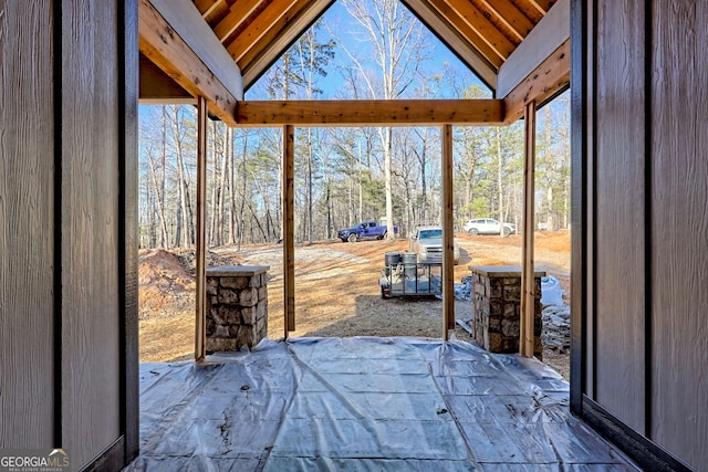 interior space featuring vaulted ceiling