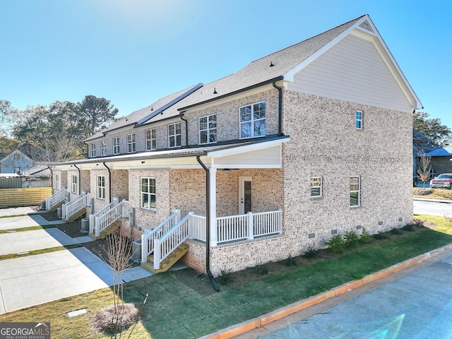 exterior space with a yard and a porch