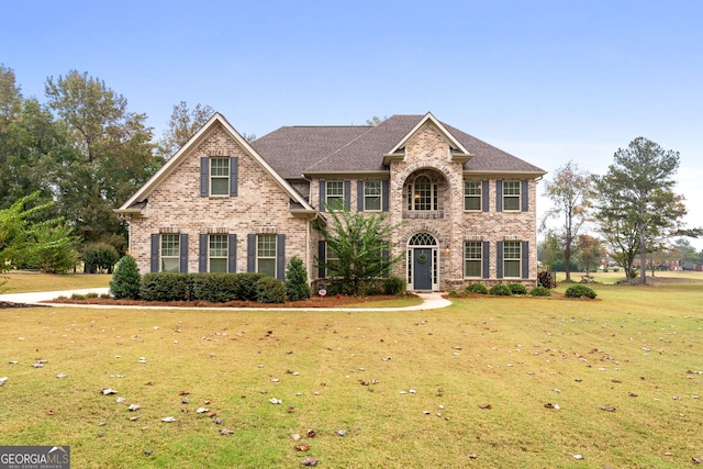 view of front of house with a front lawn