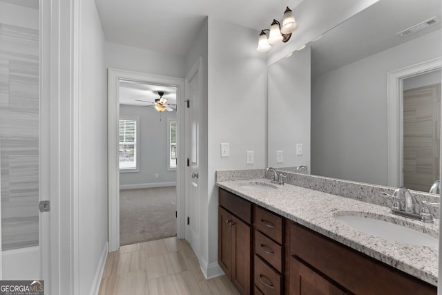 bathroom with vanity and ceiling fan