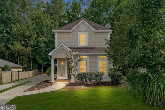 front facade featuring a front lawn