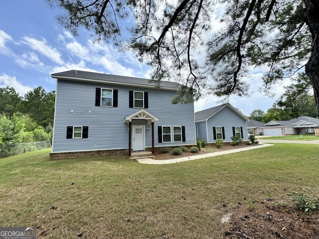 view of front of house with a front lawn