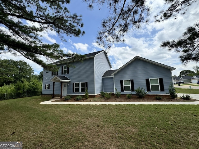 view of front of home featuring a front lawn