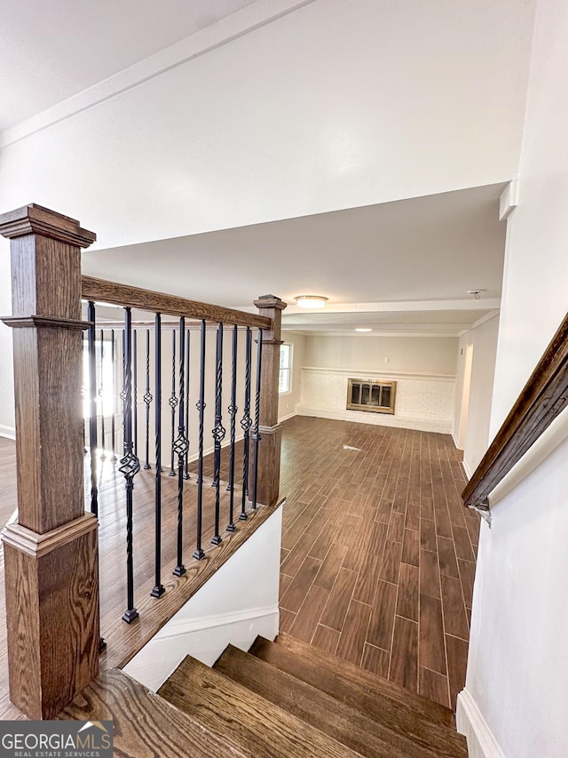 stairway featuring hardwood / wood-style floors