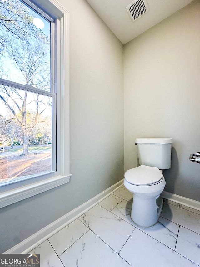 bathroom featuring toilet