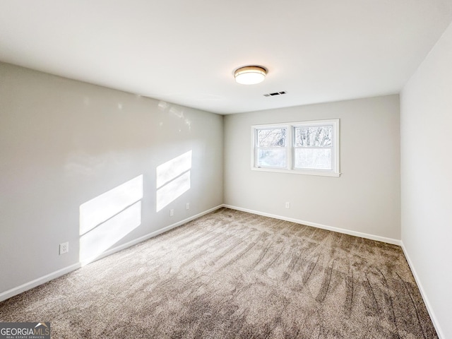 view of carpeted spare room