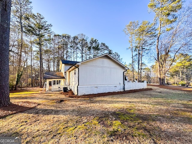 view of property exterior featuring a yard