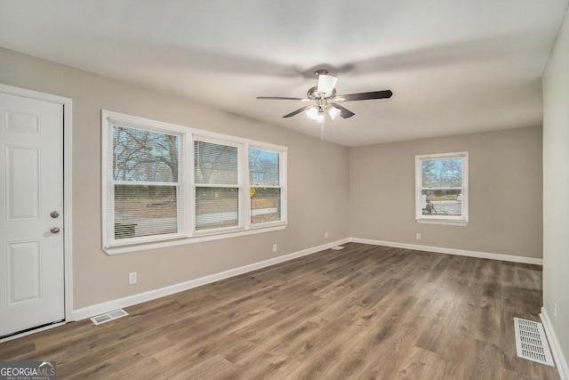 unfurnished room featuring wood-type flooring and ceiling fan