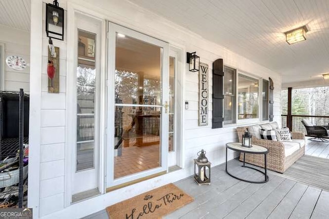 wooden deck featuring a porch