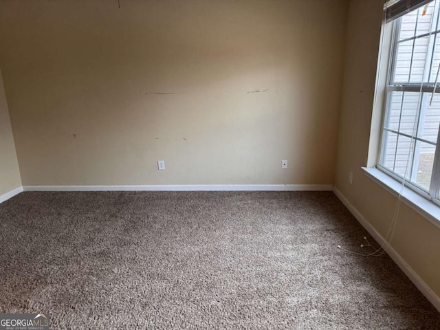 view of carpeted spare room