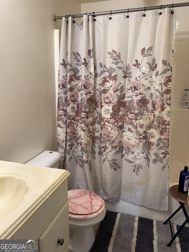 241 E Ash St, Social Circle, GA 30025 - bathroom with shower / tub combo with curtain, toilet, and vanity