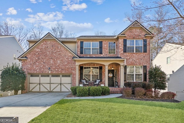 view of front of property featuring a garage, covered porch, and a front lawn