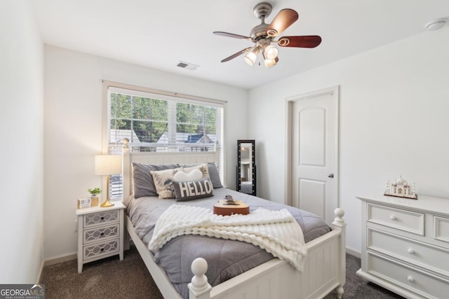 carpeted bedroom with ceiling fan