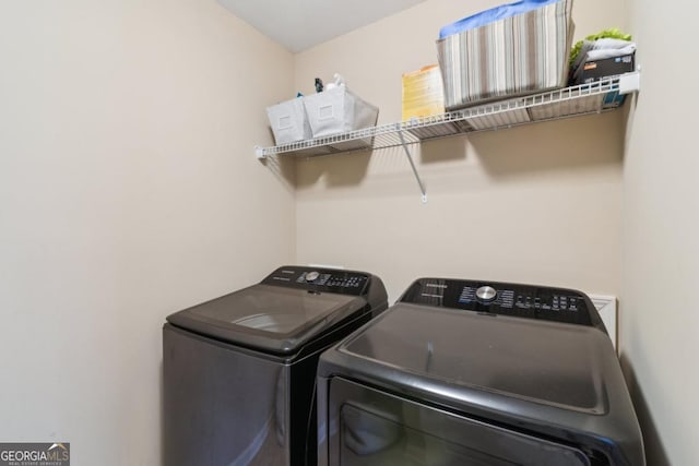 laundry area featuring washer and clothes dryer