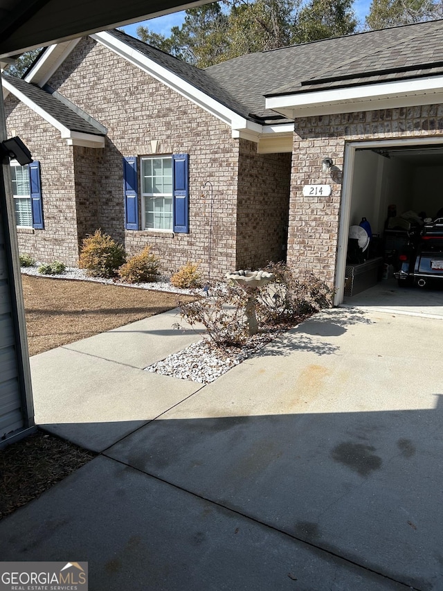 view of home's exterior with a garage